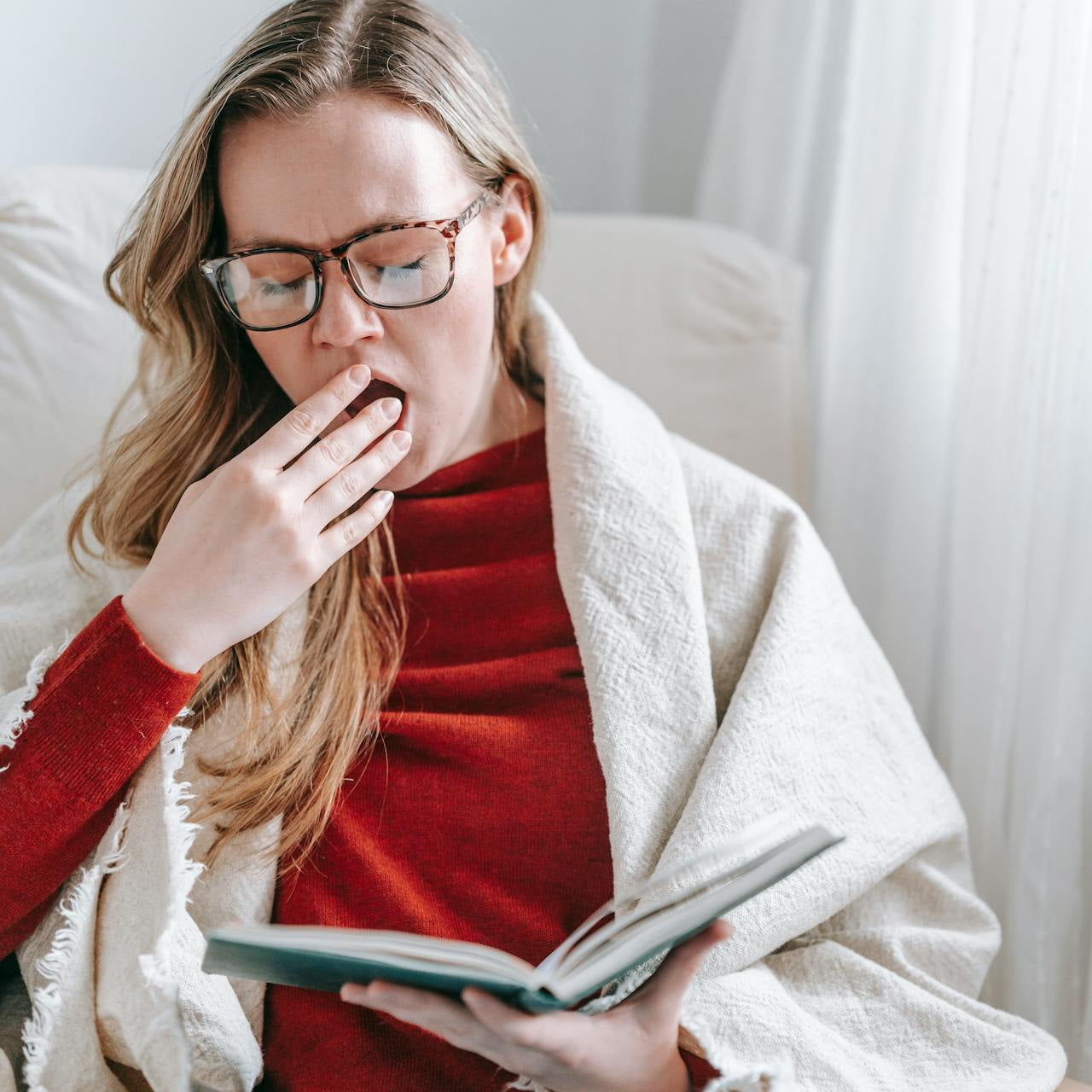 Mature woman yawning