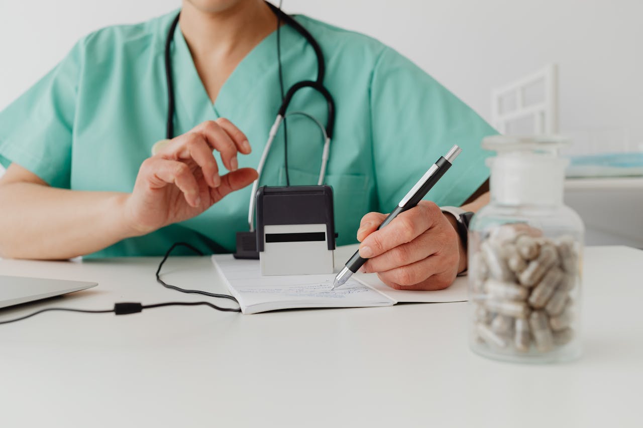 Doctor writing prescription for perimenopause consultation