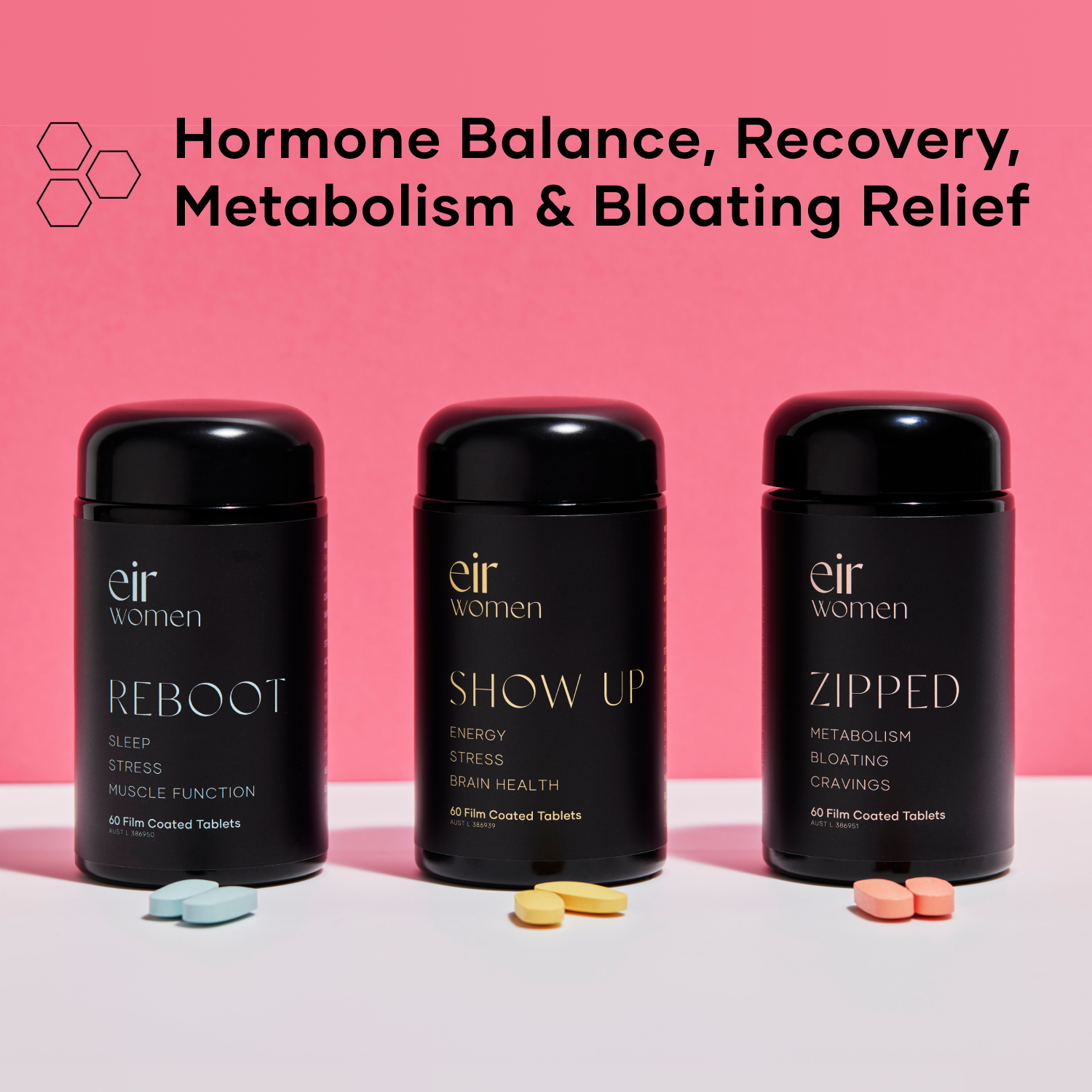 Black bottle of Reboot Eir Supplement with blue print, black bottle of Show Up Eir Supplement with yellow print, Black bottle of Zipped Eir Supplement with pink print, all against a pink background