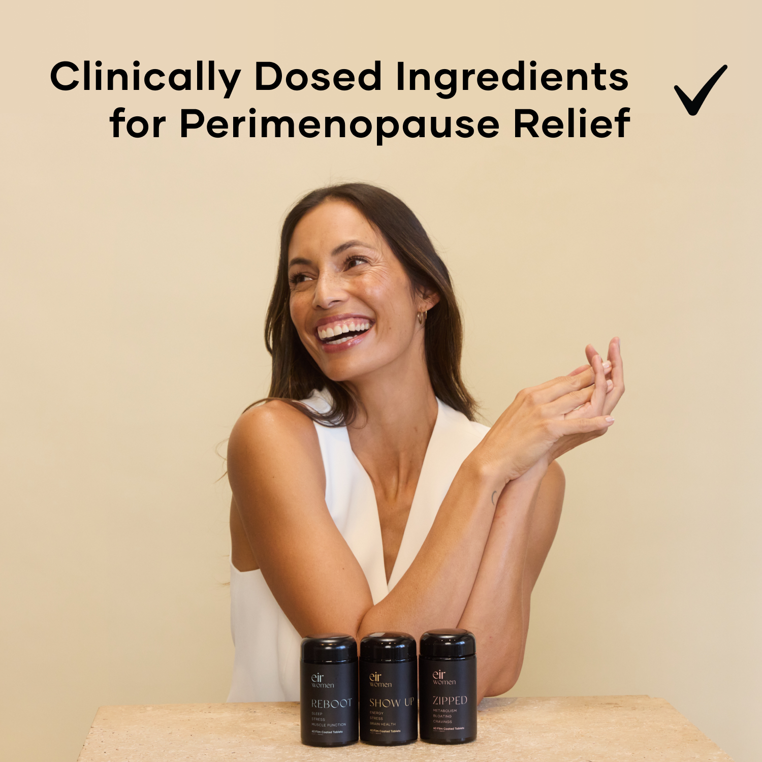 Happy woman with Peri Proof bottles Reboot, Show Up, and Zipped