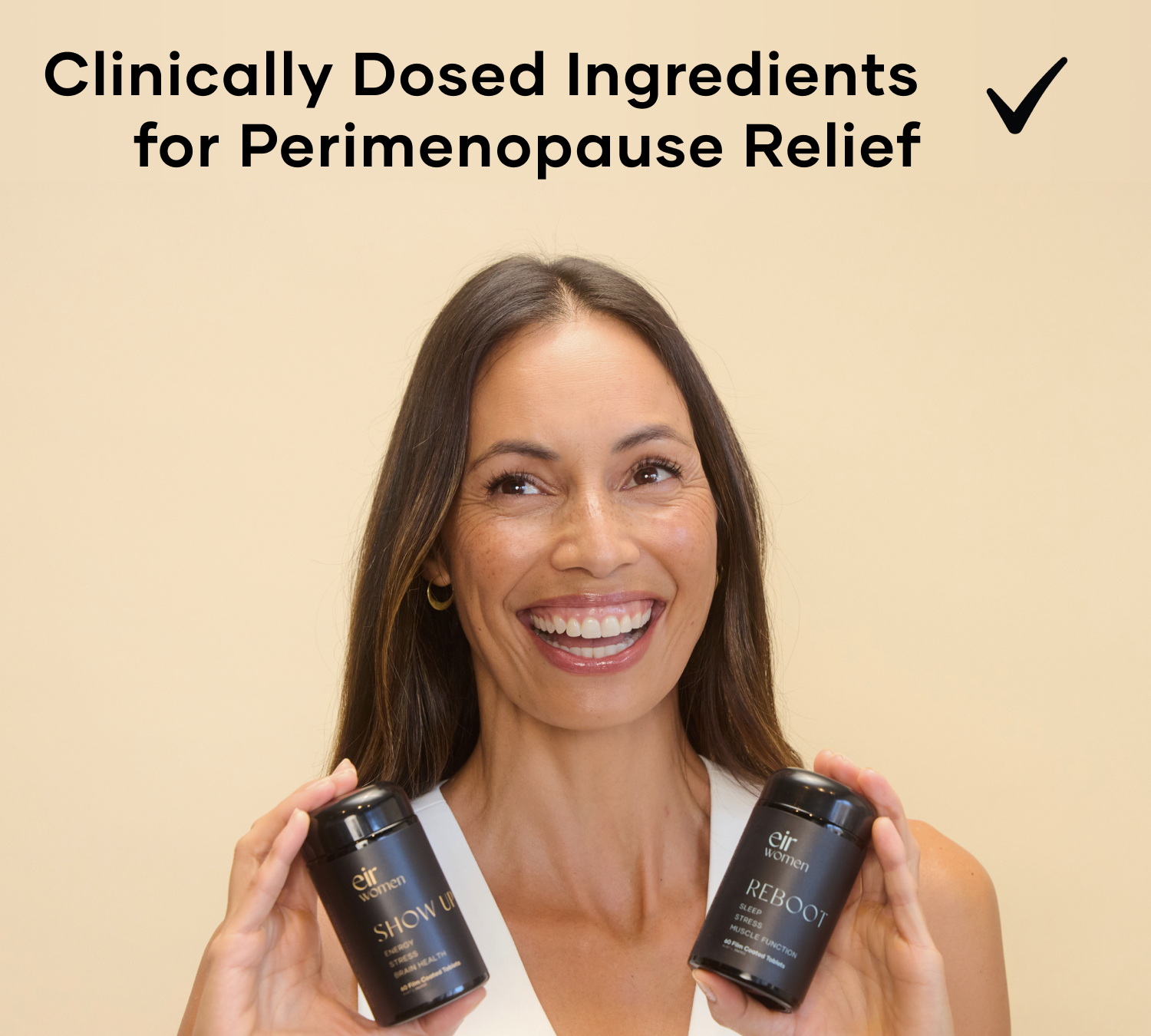 Happy woman holding bottles Show Up and Reboot - Peri-Essentials 
