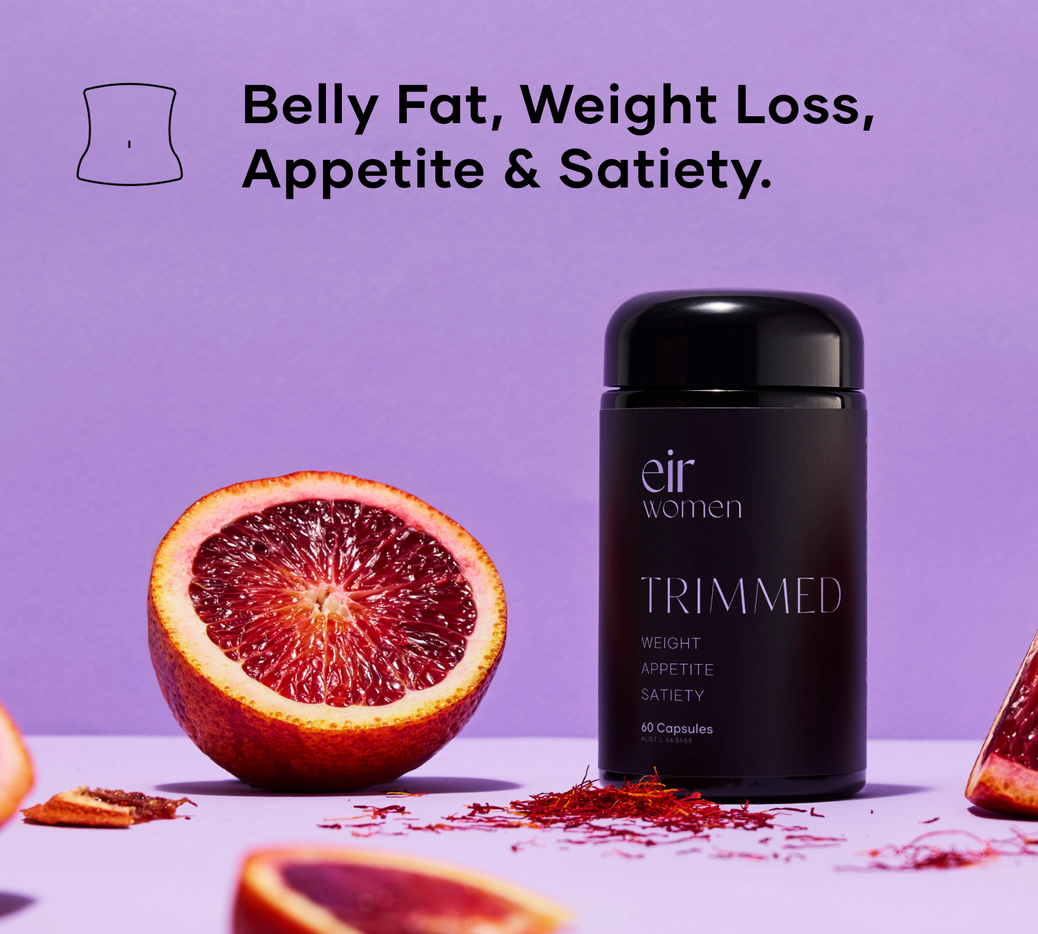 Trimmed Eir Women Weight-Loss Supplement, beside a blood orange, against a purple background 
