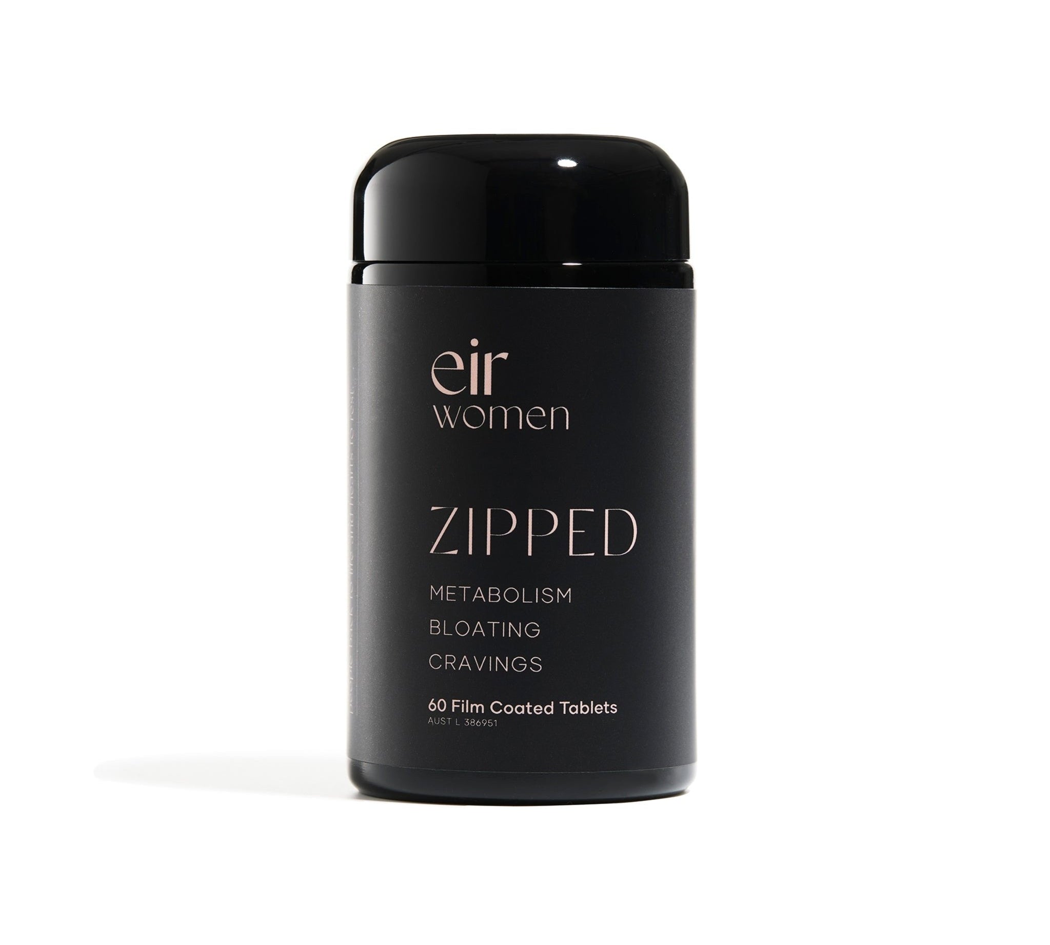 black glass vitamin bottle with pink writing